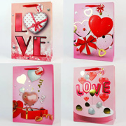 Пакет подарунковий з фольгуванням 23х18х10 см Love Korobki