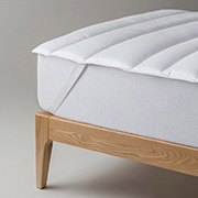 Наматрацник стьобаний Ютек Simple з гумками по кутах