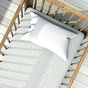 Простынь трикотажная на резинке Звезды на зеленом Home Line в детскую кроватку