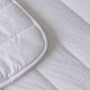 Наматрацник стьобаний махровий Terry Lux Ютек з гумками по кутах